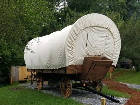 Stay The Night In A Old-Fashioned Covered Wagon At Rose Creek Campground In North Carolina