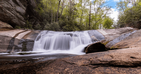 Hike Less Than A Mile To This Spectacular Towering Cliff And Waterfall In North Carolina