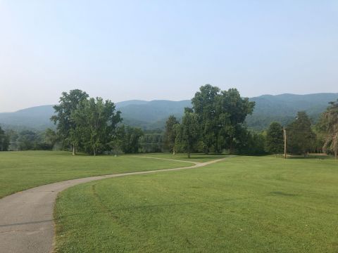 Take A Paved Loop Trail Around This Tennessee Mountain Lake For A Peaceful Adventure