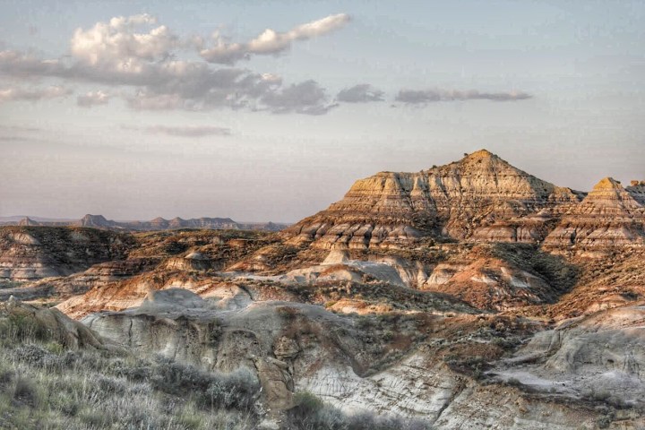 Distant view of multicolored badlands hills at the Terry Badlands in Montana