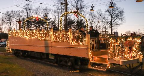 Ride Through A Tunnel Of Christmas Lights In A Trolley Car At Winterfest In Connecticut