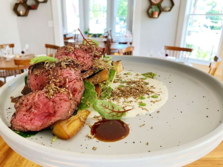 Deconstructed meat and vegetable dish at Heirloom in Lewes. Lewes is a small beach town on Delaware's Culinary Coast - a trail of cities down the Atlantic Coast with award-winning restaurants.