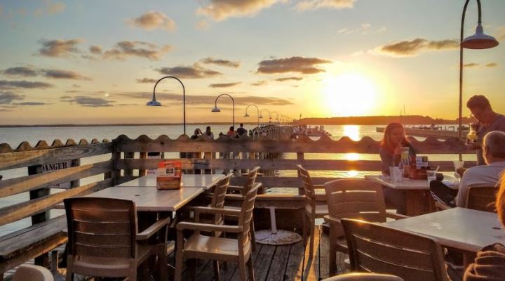 Delaware's Culinary Coast offers waterfront dining and beautiful views. The Rusty Rudder in Dewey is known for its drinks and coastal sunsets.