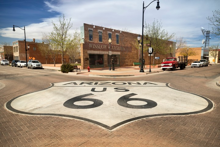 Historic Route 66 road in Winslow, Arizona USA. The highway, which became one of the most famous roads in the United States, originally ran from Chicago, Illinois to Los Angeles California.