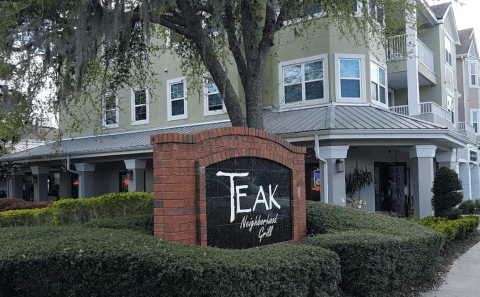 You'll Barely Be Able To Take A Bite Of The Massive Burgers At Teak Neighborhood Grill In Florida