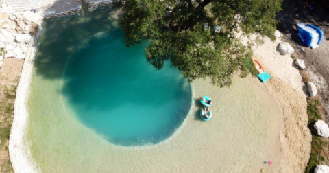 Enjoy A Private Swimming Hole With A Waterfall Beach When You Stay At Bird Haus Farms In Texas