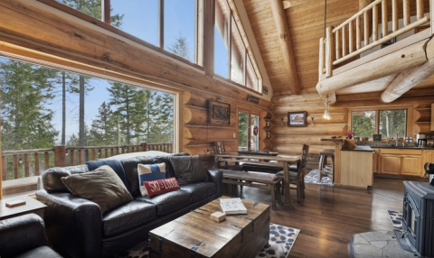 Sleep Among Towering Trees At This Wondrous Log Cabin In Montana