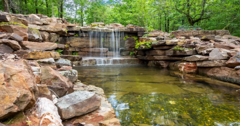 A Tropical-Inspired Getaway In Oklahoma, This Cabin In Broken Bow Has A Private Waterfall