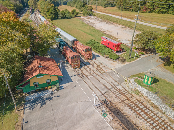 An aerial view of the North Alabama Railroad Museum, which offers a popular fall foliage train ride in Alabama.