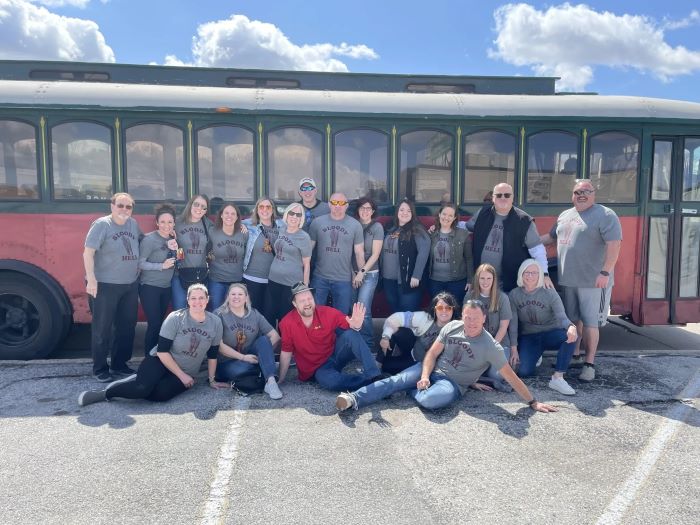 Tour group outside trolley