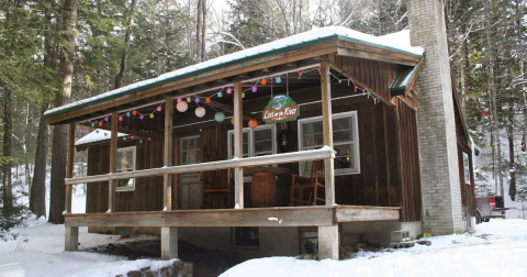 Cozying Up At This Charming Cabin In New Hampshire Under A Blanket Of Snow Is The Ultimate Winter Retreat