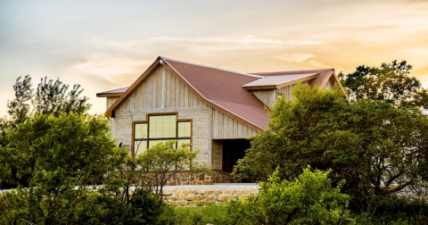 There's A Breathtaking Lodge Tucked Away On This 12-Acre Lake In Kansas