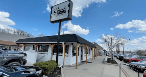 This Iconic Little Diner Is Still Slinging Fry-Covered Burgers By The Bagful